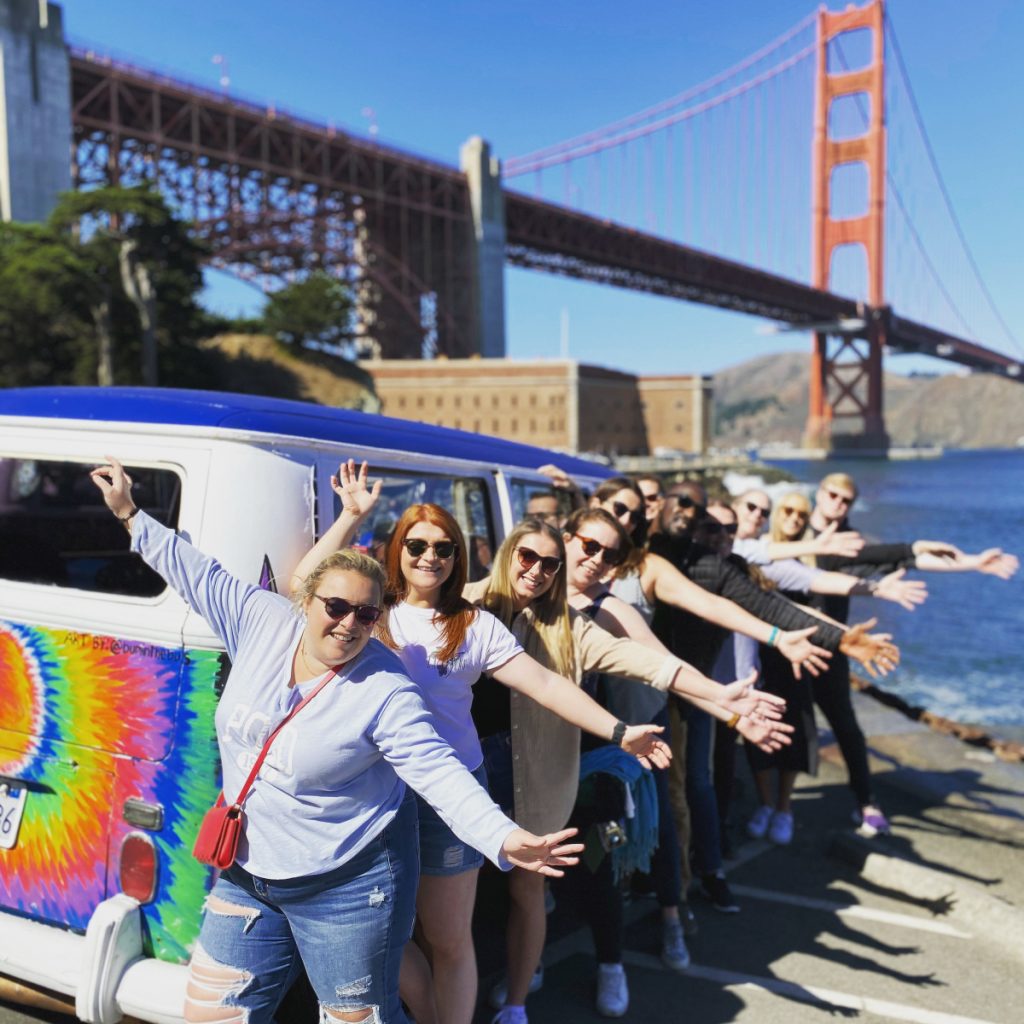 Group of ladies with VW and Golden Gate Bridge